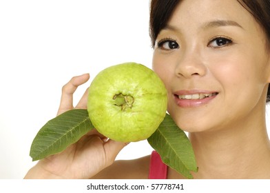 Portrait Of Very Cute Woman Holding Fresh Guava