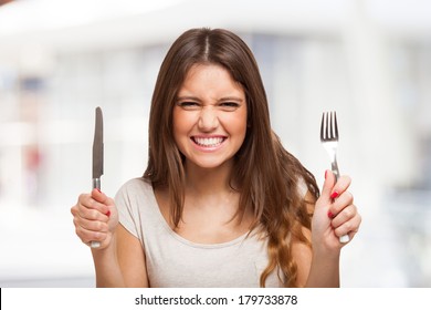 Portrait of a very hungry young woman
