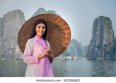 Portrait of Vietnamese girl traditional dress at Halongbay, Vietnam