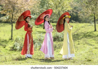 Portrait of Vietnamese girl traditional dress,Ao dai is famous traditional costume for woman in Vietnam.
