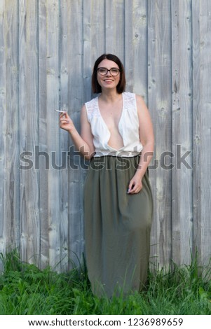 Image, Stock Photo STANDING IN FRONT OF A WOODEN WALL