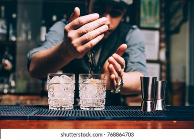 Portrait Of Vintage Barman Making Cocktails And Working At Pub Or Bar