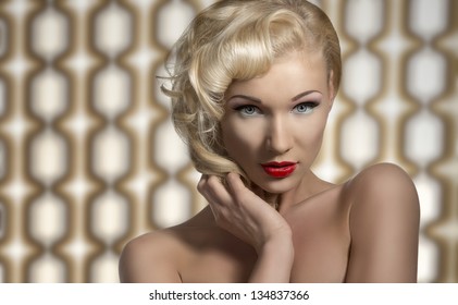 Portrait Of Vintage Woman With Retro Make-up And Hair-style, Looks In Camera And Posing As A Diva On 70 Background