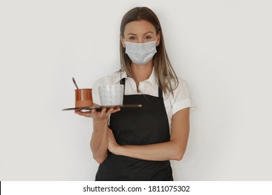 Portrait Of Waitress Wearing Face Mask At Work, Isolated