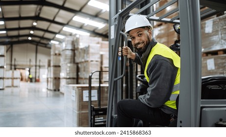 Portrait of warehouse worker driving forklift. Warehouse worker preparing products for shipmennt, delivery, checking stock in warehouse. Banner with copy space. - Powered by Shutterstock