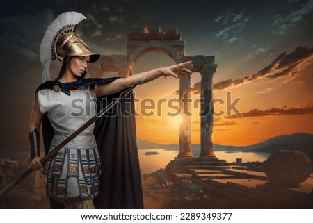 Portrait of warlike greek woman dressed in tunic and cloak holding long spear.