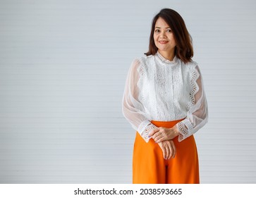 Portrait Of Warm Personality Senior Older Asian Woman In Casual Dress Friendly Pose And Looking To Camera With Successful Feeling And Self-confident.