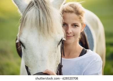 Portrait Of A White Horse And Woman