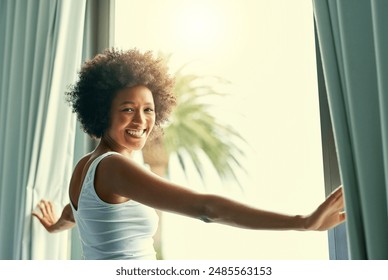 Portrait, window and curtains of woman for wake up, bright light and wellness by bedroom in home. Morning, female person and fresh air after sleeping, resting and sunshine by flare in apartment - Powered by Shutterstock