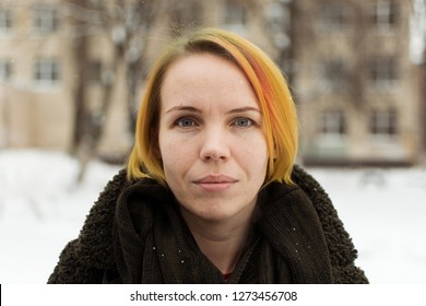 Portrait Of A Woman 30-40 Years Old Without Makeup On The Street.