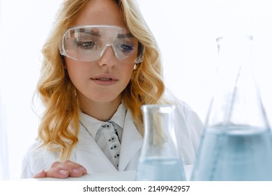 Portrait Of A Woman Biologist In The Lab