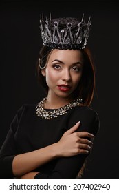 Portrait Of Woman In Black Crown