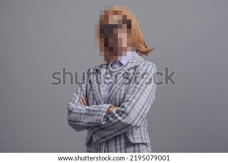 Portrait of woman with blurred face, identity protection concept