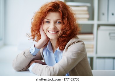 Portrait Of A Woman With Bright Red Hair