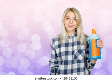 Portrait of a woman with cleaning liquid