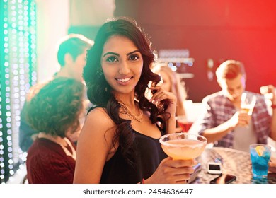 Portrait, woman and cocktail in party for celebration, birthday and event with friends. Disco lights, female person and alcohol for drinking in night club, concert and enjoying with techno music - Powered by Shutterstock