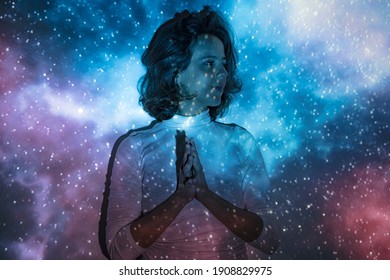 Portrait of a woman connecting with the universe 