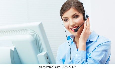 Portrait of woman customer service worker, call center smiling operator with phone headset. Young female business model. - Powered by Shutterstock