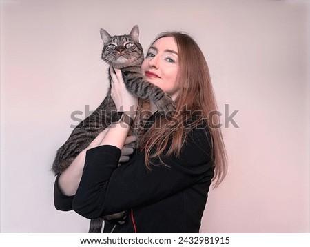 portrait of a woman with a distinguished cat
