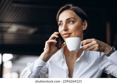 Portrait of woman drinking coffee - Powered by Shutterstock