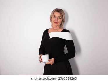 Portrait of woman drinking coffee - Powered by Shutterstock