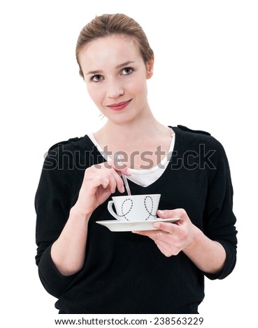 Portrait of a woman drinking coffee