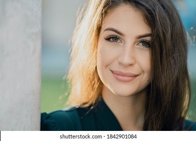 Portrait Of A Woman Of European Appearance Brunette Long Hair, Looking At The Camera Attractive Good Looks Not A Model. I Thought About My Tasks And Plans For The Near Future