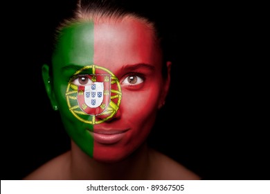 Portrait of a woman with the flag of the Portugal painted on her face. - Powered by Shutterstock