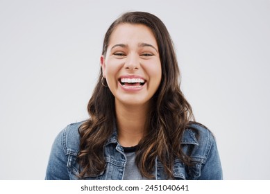 Portrait, woman and happy with laugh by studio background for mockup space, comic joke and excited expression. Smile, isolated and female person by grey backdrop for happiness, meme and gen z comedy - Powered by Shutterstock