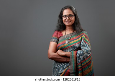 Portrait of a woman of Indian origin wearing sari