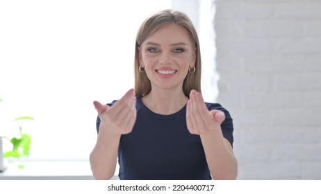 Portrait Of Woman With Inviting Gesture