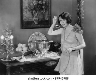 Portrait Of Woman With Ladle And Punch Bowl