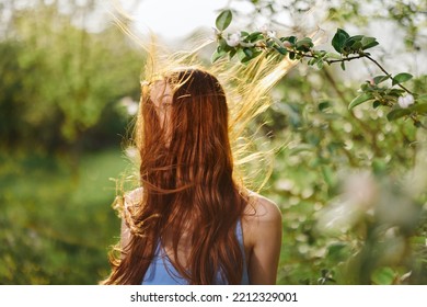 Portrait Of A Woman With Long Flyaway Hair Red Hair In Summer, The Concept Of Health And Care For Long Thick Hair Beauty