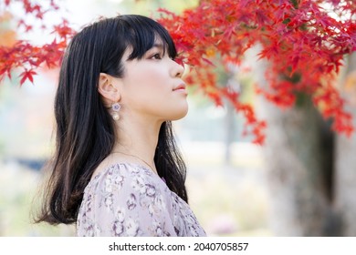 A Portrait Of A Woman Looking Up.