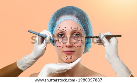 Portrait of woman with marks on face for plastic surgery