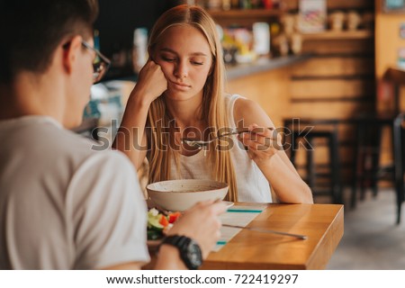 Portrait of woman with no appetite. He has tired, bad mood and sleepy
