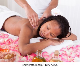 Portrait Of Woman Receiving Massage In Spa