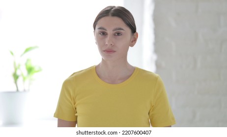Portrait Of Woman Shaking Head As No Sign