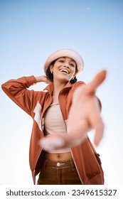 Portrait, woman smile and offer helping hand to welcome outdoor on low angle mockup space. Happy, palm and person giving assistance for support, care or acceptance of handshake sign for invitation - Shutterstock ID 2349615327