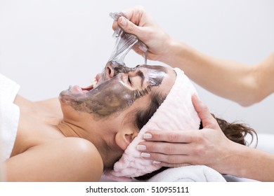 Portrait of a woman at the spa, screaming during the removing the mask from the face - Shutterstock ID 510955111