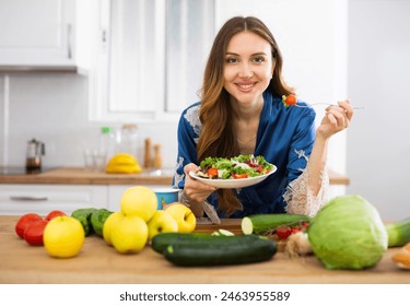 Portrait of woman standing in home kitchen - Powered by Shutterstock