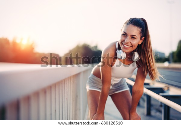 Portrait Woman Taking Break Jogging Stock Photo Edit Now 680128510