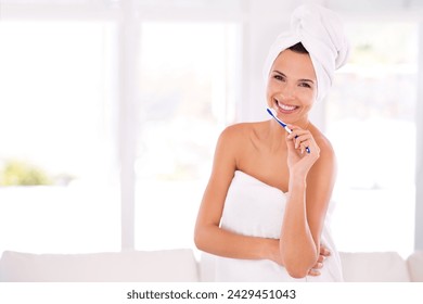 Portrait, woman and toothbrush for dental health, clean and healthy teeth with smile, care and towel. Happy, female person and mouth for oral, hygiene and fresh breath after morning shower at home