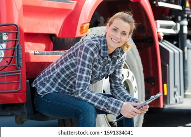 Portrait Of Woman Truck Driver Concept