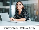 Portrait, woman and typing in office with laptop for work as receptionist, administrative support and professional. Female employee, happy and email to confirm schedule and appointment planning.