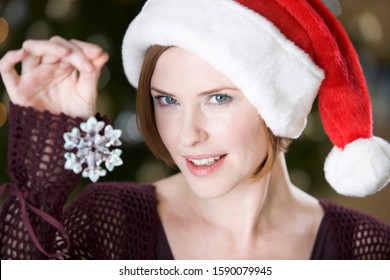 Portrait Of A Woman Wearing Santa's Hat