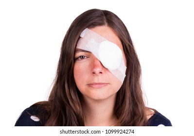 Portrait Of Woman Wearing White Eye Patch As Protection After Injury