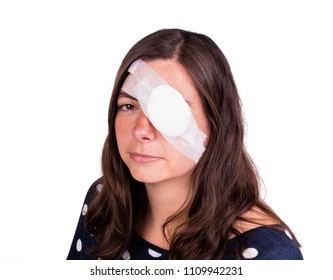 Portrait Of Woman Wearing White Eye Patch As Protection After Injury