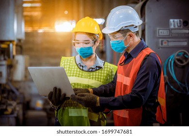 Portrait Woman Worker And Engineer Under Inspection And Checking Production Process On Factory Station By Wearing Safety Mask To Protect For Pollution And Virus In Factory.