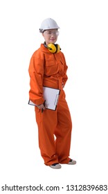 Portrait Of A Woman Worker In Mechanic Jumpsuit With Helmet Earmuffs And Safety Goggles Is Holding Clipboard And Pen Isolated On White Background Clipping Path